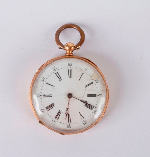 Montre de gousset en or 18K (750). Bélière en métal. Accident à l'émail.

Poids brut : 51,1 g