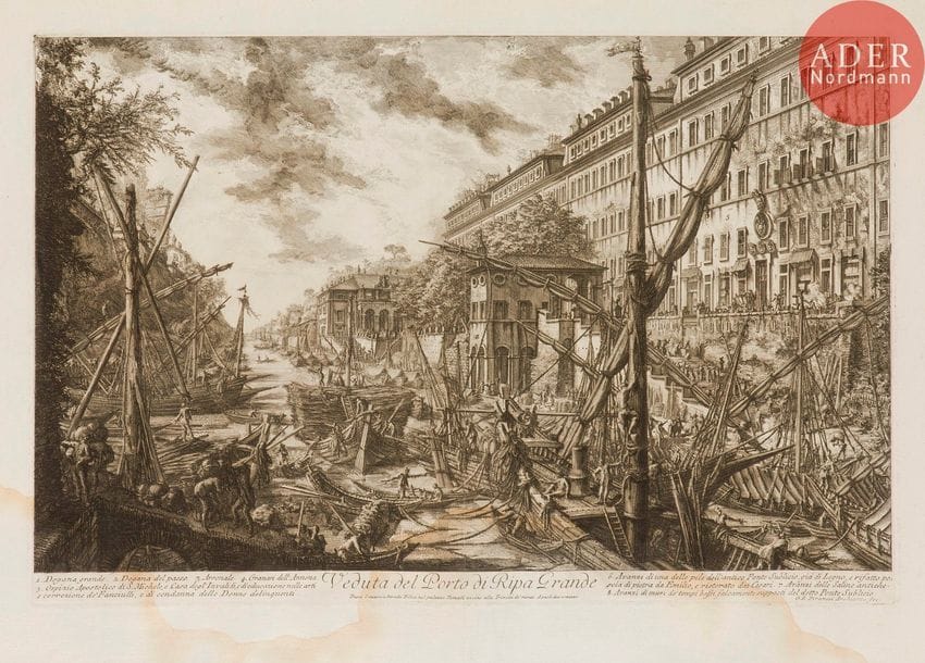 Giambattista Piranesi (1720-1778) 
 [Port de Ripa Grande]. Veduta del Porto di Ripa Grande. 1753. Eau-forte. 615 x 405. Hind 27 (ii/vi). Belle épreuve sur vergé, avant effaçage du prix et de la barge au centre. Pli de séchage vertical médian. Trous de reliure au bord gauche. Courte déchirure en tête. Large auréole claire d’humidité dans la partie inférieure du feuillet. Toutes marges. Tirage romain.