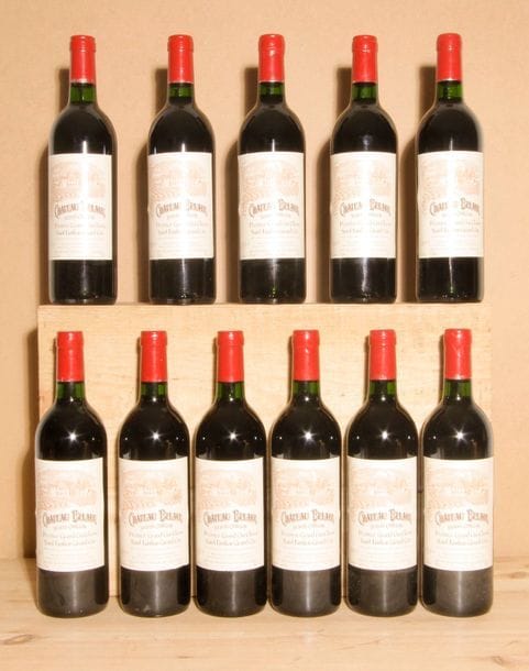 11 B CHÂTEAU BELAIR (Caisse Bois d'origine remise à l'acquéreur) 1 e.l.a; quelques marques bas capsules sinon parfaites, GCC1B St Emilion, 1994