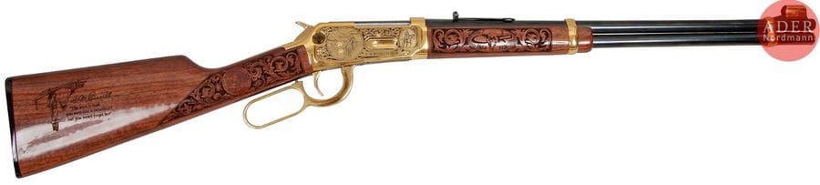 Carabine Winchester modèle 94AE, «?CM Russel Museum 1 of 300?», calibre 30-30.
Canon de 49?cm (20»). Finition dorée, argentée et gravée d’indiens et cowboys (A&A Rapid City). Crosse en noyer sculpté en suite
Longueur totale?: 96?cm
Dans un coffret «?Investment Arms?».
Catégorie C à déclarer. N°6478019. Exemplaire n°234 sur 300.