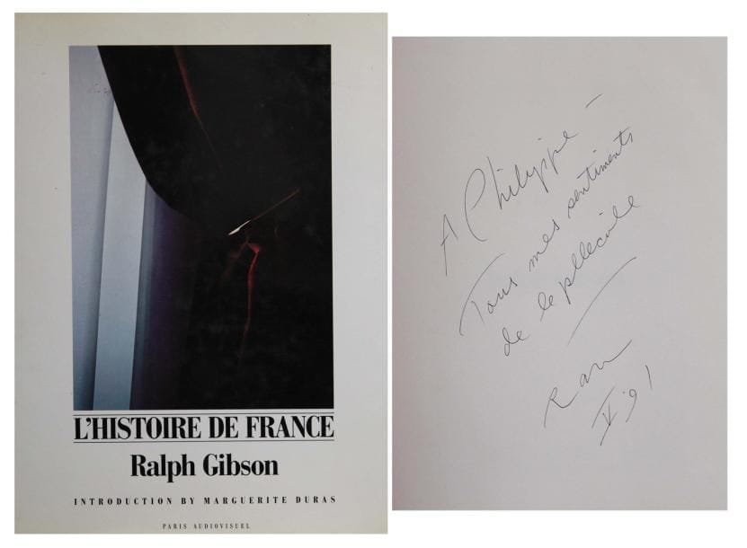 Ralph Gibson (né en 1939)
L'histoire de France Editions Paris Audiovisuel, 1991. In-4 (36 x 27 cm). 119 pp. Préface de Marguerite Duras. Edition originale dédicacée et signée par Ralph Gibson : «Tous mes sentiments de la pellicule». Reliure d'éditeur sous jaquette illustrée.  