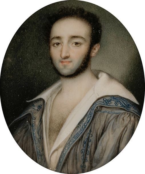 Homme à mi-corps, peut-être un artiste, la chemise largement ouverte sur un habit à l’orientale brodé de bleu
Miniature sur ivoire, vers 1830-1840, ovale à vue 6,7 x 5,3 cm
Cadre en bois vernis noir, visière en laiton doré, rect. 12,3 x 10,3 cm
(ivoire gondolé, sinon bon état)