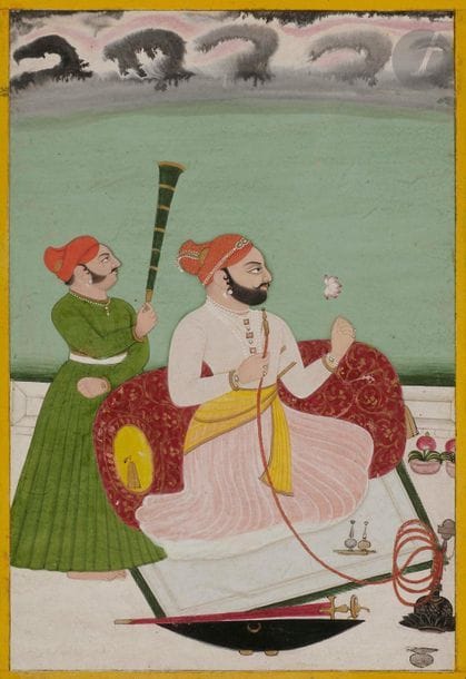 Raja fumant la huqqa, Inde du nord, Rajasthan, Bundi, XIXe siècle
Gouache et or sur papier épais. Le raja est assis contre un gros coussin sur une terrasse, en train de fumer la huqqa et tient une fleur de lotus sous un ciel tourmenté. Son épée et son bouclier sont posés à côté de lui et un serviteur l’évente avec un morshal.
22,2 x 15,6 cm
État : encadrements jaune et noir agrandis.

Raja smoking a huqqa, North India, Rajasthan, Bundi, 19th century


Ancienne collection de Madame A.O. (lots 56 et de 78 à 125)