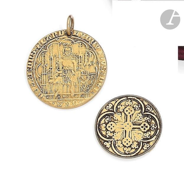 Médaille en or 18K (750) porte-souvenir. 
Poids brut : 13,9 g