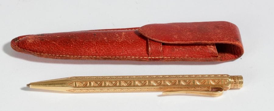 CARAN D'ACHE. Porte-mine en or 18K (750) gravé. Poids brut: 24,9 g