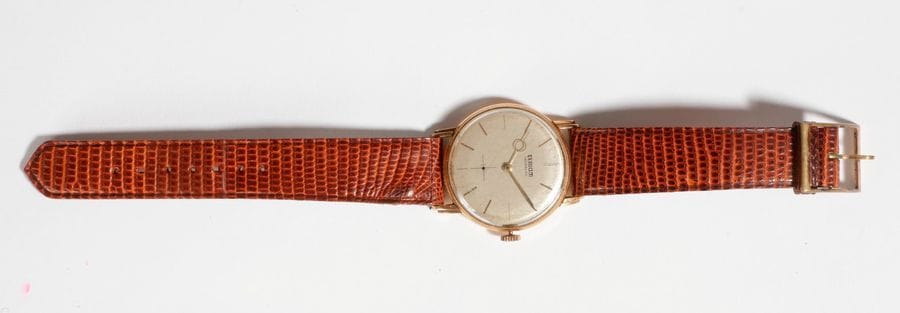 Teriam Incabloc. Montre bracelet d'homme en or, bracelet en cuir marron.

Poids brut : 35,9 g

