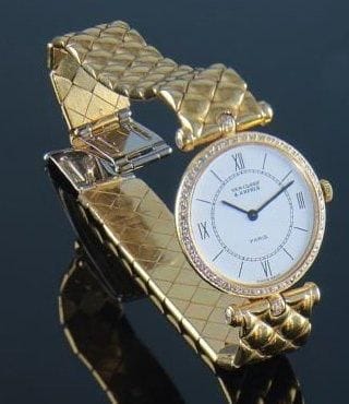 Montre-bracelet de dame en or jaune, ronde. Le cadran serti de brillants. Le tour de poignet en or jaune. Lady Arpels, Van Cleef & Arpels. Signée et numérotée. Poids brut : 62 g. (écrin).