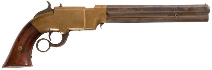 Rare pistolet à répétition Volcanic calibre 38.
Canon à pans, bleui, gravé sur le dessus « Patent New Haven Conn Feb 14-1854 ». Carcasse en bronze. Levier d’armement à anneau numéroté « 2197 » et « V ». Plaquettes de crosse en noyer verni (légers éclats).
Longueur : 37 cm