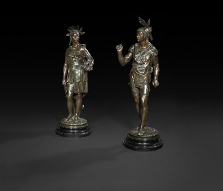 Deux figures d'indien en régule patiné, la femme tenant une coupe pour la cueillette, l'homme en tenue de chasseur (manque dans la main et accident au carquois) ; signé Salmson pour Jules Salmson (1823-1902) ; (bases en bois noirci).

Fin du XIXe siècle (accidents et manques).

H : 63 cm