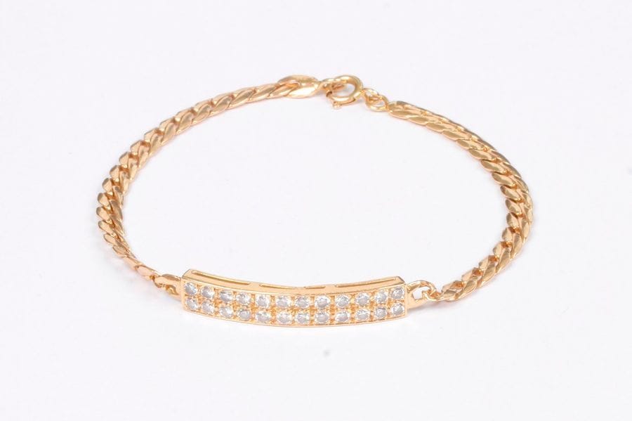 Bracelet gourmette en or 18K (750), orné de 24 diamants ronds. Poids : 11,3 g