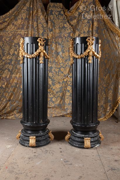 Pair of black and gold lacquered wood selettes...