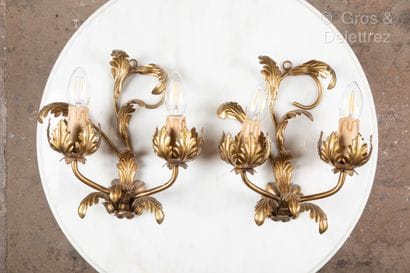 Pair of gilded metal sconces decorated with...