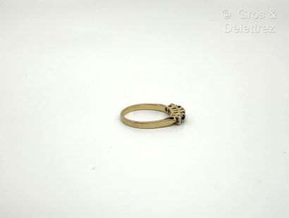 Bague jarretière en or jaune 750 millièmes,...