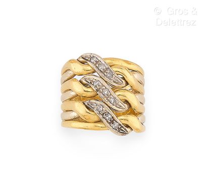 Bague bandeau à tresse stylisée en or jaune...