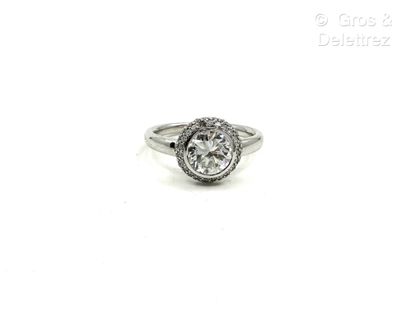 Bague à chaton circulaire en or gris 750...