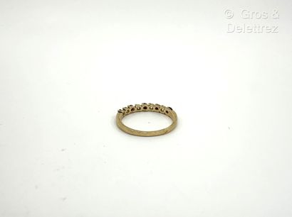 Bague rivière en or jaune 750 millièmes,...
