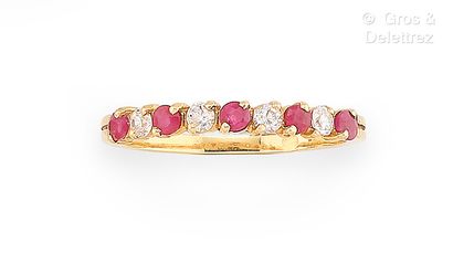 Bague rivière en or jaune 750 millièmes,...