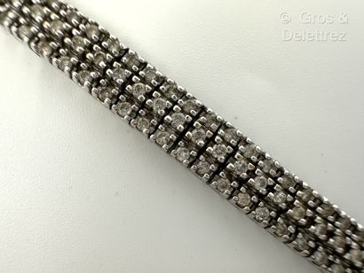 Bracelet ligne en or gris 585 millièmes à...