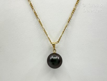 Pendentif en or jaune 585 millièmes et perle...