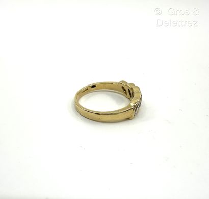 Travail italien
Bague jarretière en or jaune...