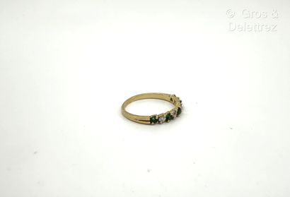 Bague rivière en or jaune 750 millièmes,...