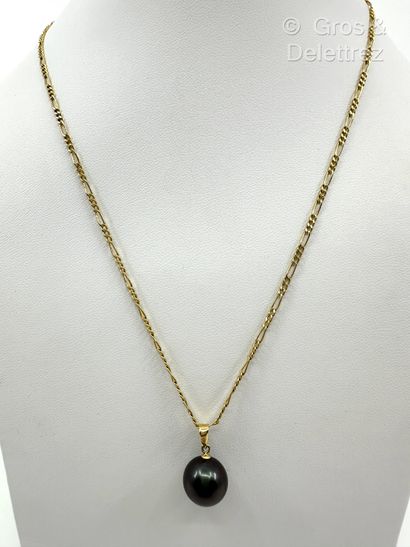 Pendentif en or jaune 585 millièmes et perle...
