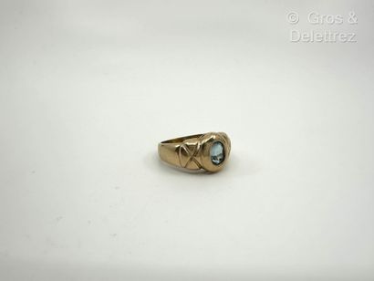 Bague jonc en or jaune 375 millièmes et topaze...