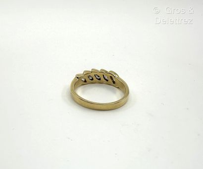 Travail italien
Bague jarretière en or jaune...
