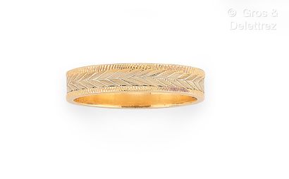 Bague jonc plat en or jaune et or gris 750...