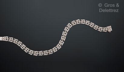 Travail italien
Bracelet ligne en or gris...