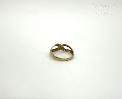 Bague jonc croisé en or jaune et or gris...
