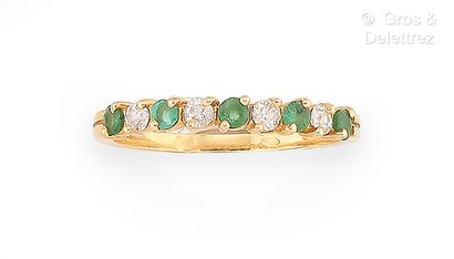 Bague rivière en or jaune 750 millièmes,...