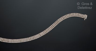 Bracelet ligne en or gris 585 millièmes à...