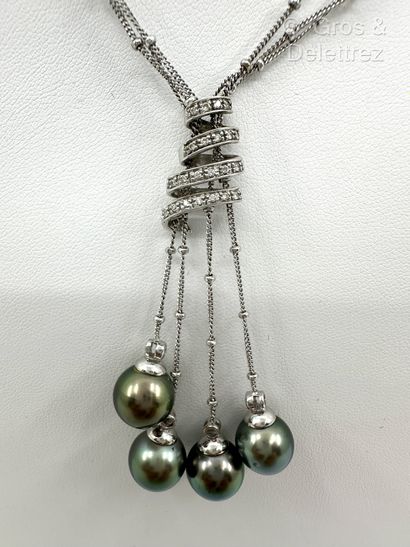 Collier « Pompon » en or gris 375 millièmes...