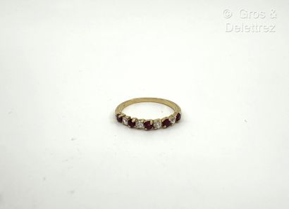 Bague rivière en or jaune 750 millièmes,...