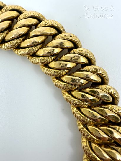 Travail français
Bracelet en or jaune 750...