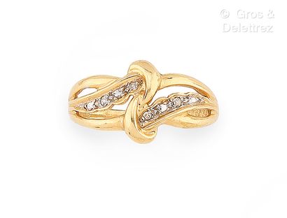 Bague « Volutes » en or jaune et or gris...