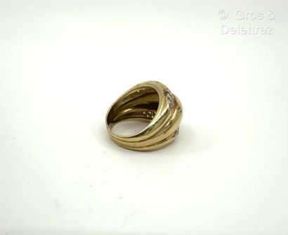 Bague triple godrons en or jaune 750 millièmes...