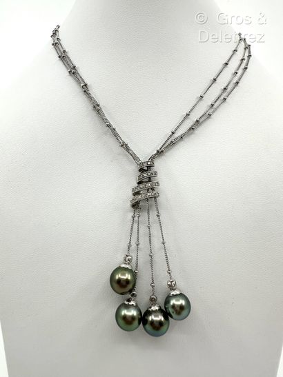 Collier « Pompon » en or gris 375 millièmes...