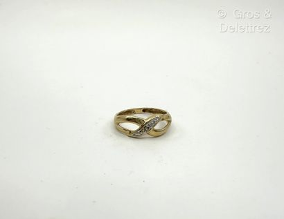 Bague jonc croisé en or jaune et or gris...