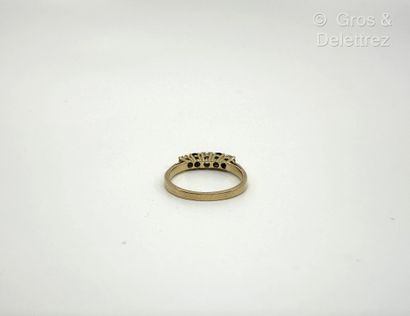 Bague jarretière en or jaune 750 millièmes,...