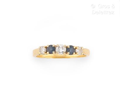 Bague jarretière en or jaune 750 millièmes,...