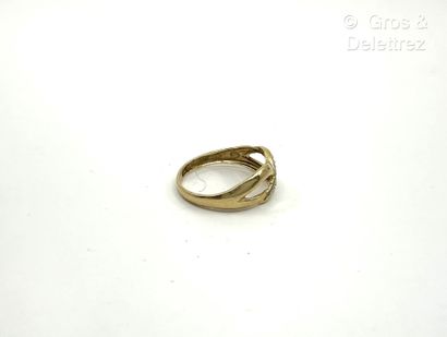 Bague jonc croisé en or jaune et or gris...