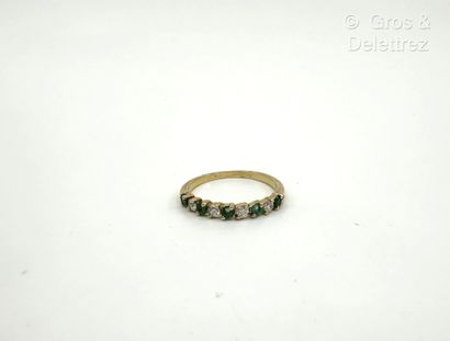 Bague rivière en or jaune 750 millièmes,...