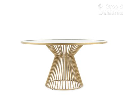 Modern work
Dining table with circular glass...
