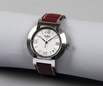 HERMES Paris
*Montre d'Homme ronde «Nomade»...