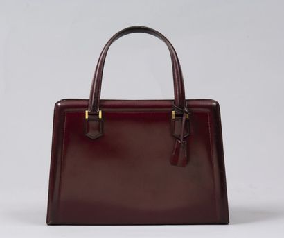 HERMES Paris
*Sac Pullman en box bordeaux,...