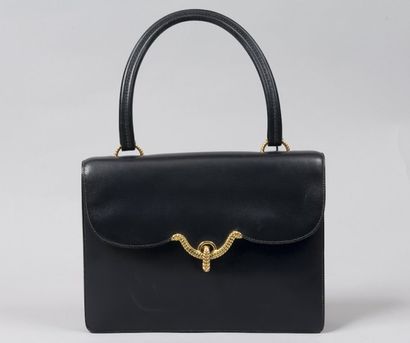 HERMES Paris
*Sac en cuir marine, attaches...
