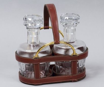 HERMES Paris
*Cave à alcool portable en cuir...