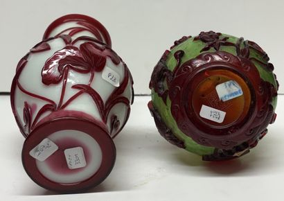 China, 20th century
Two glass vases from...